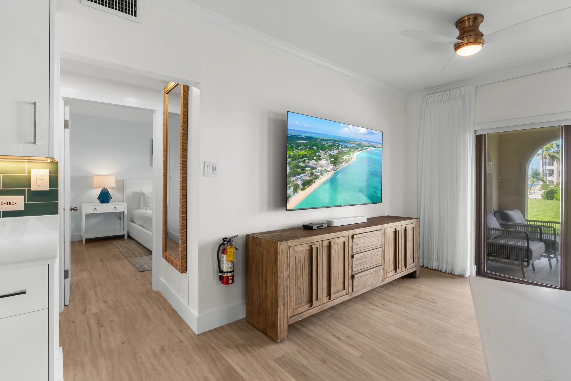 Living room with media wall — Seven Mile Ocean View