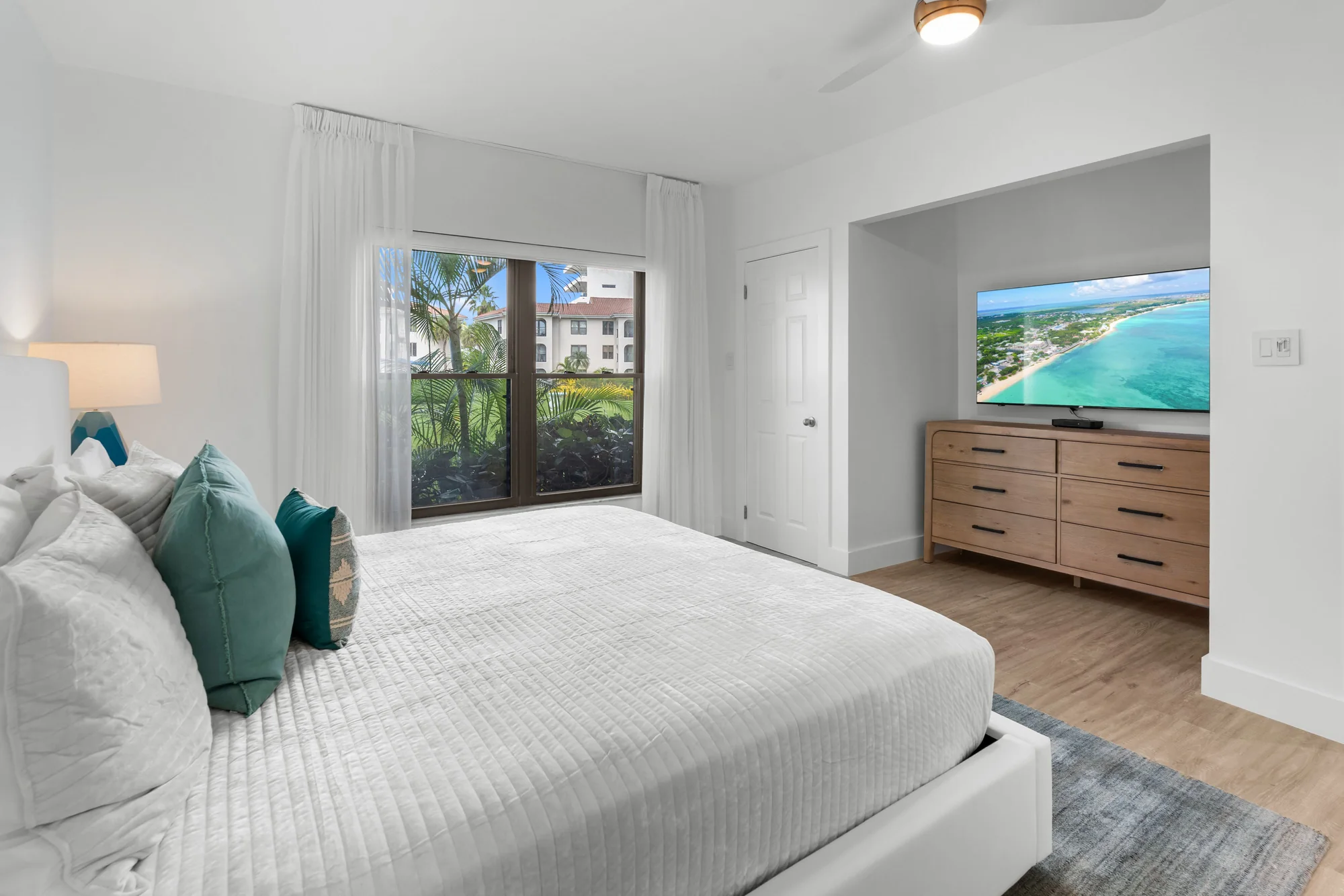 Bedroom with garden view — Seven Mile Ocean View