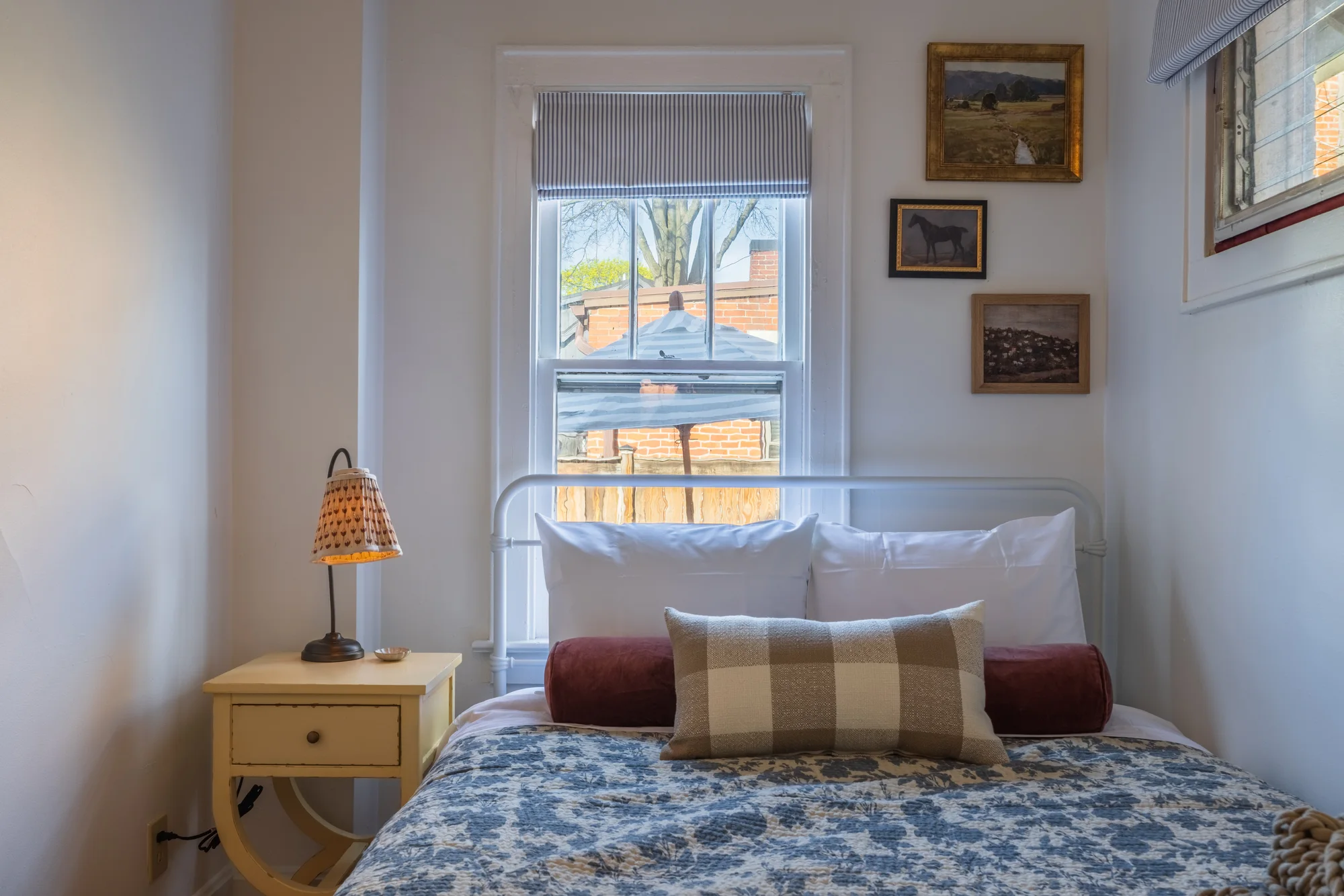 Bedroom with layered patterns — German Village Cottage