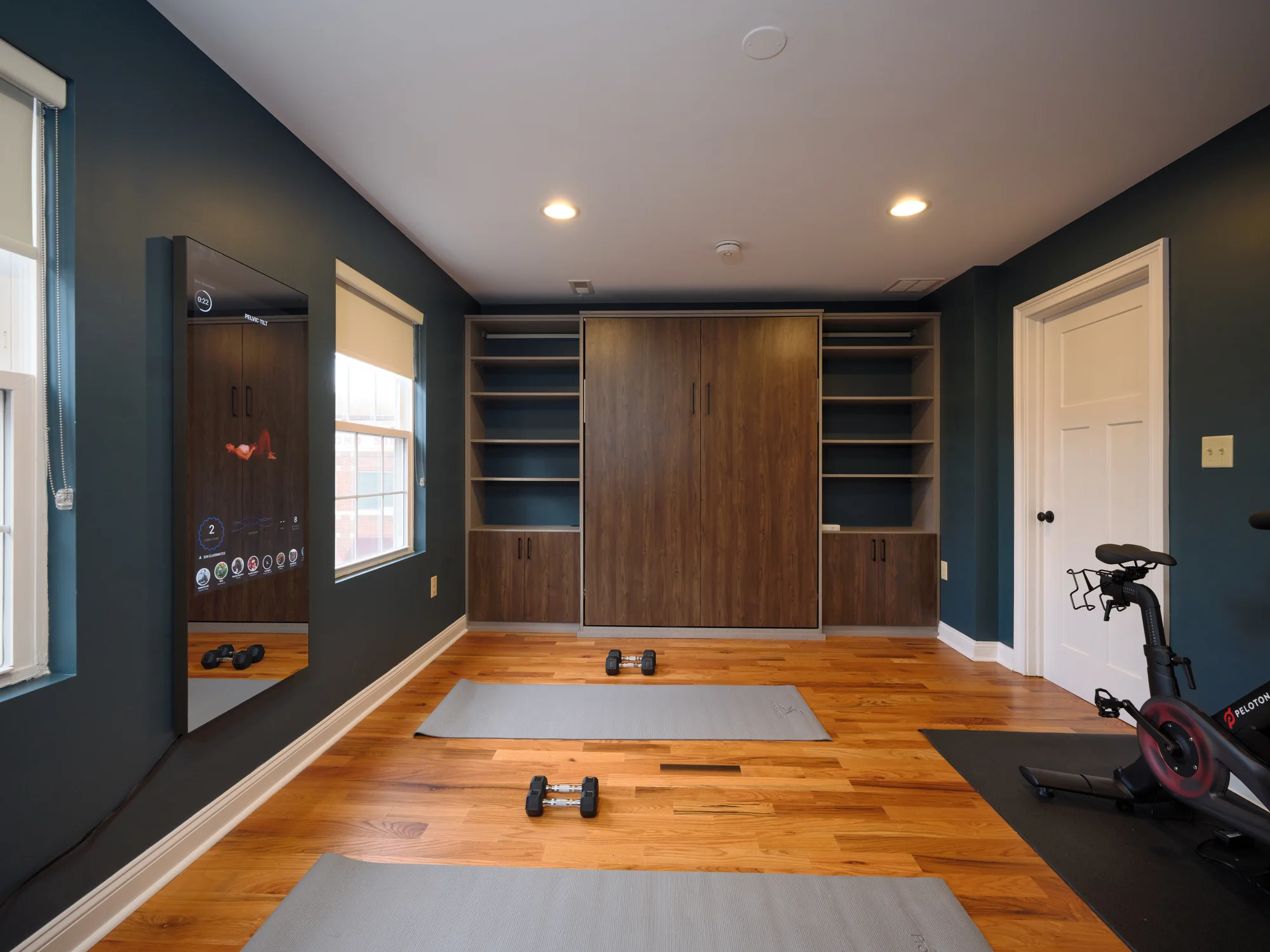Bedroom with wood-slat wall — The Lambertville Haven
