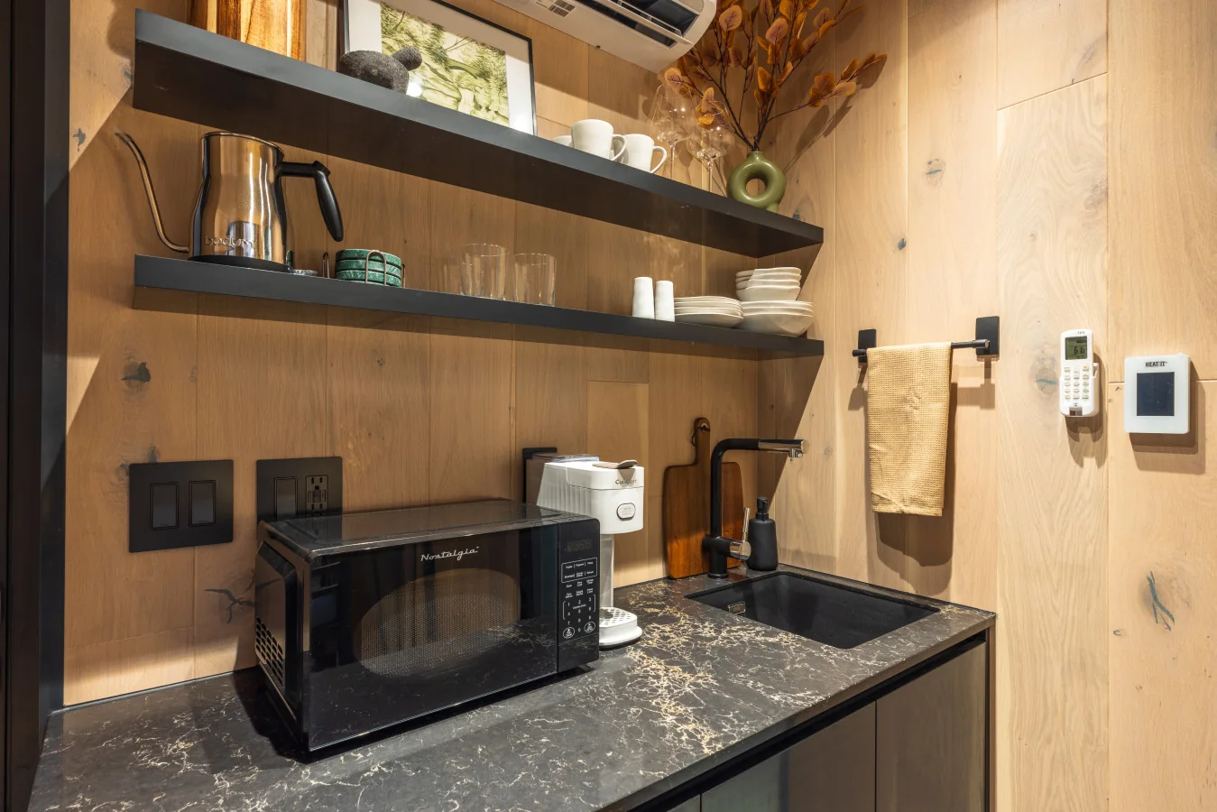 Kitchen and living, natural wood — The Mirage Escape