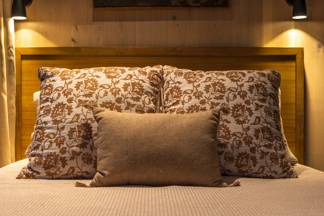 Earth-tone bedroom — The Mirage Escape