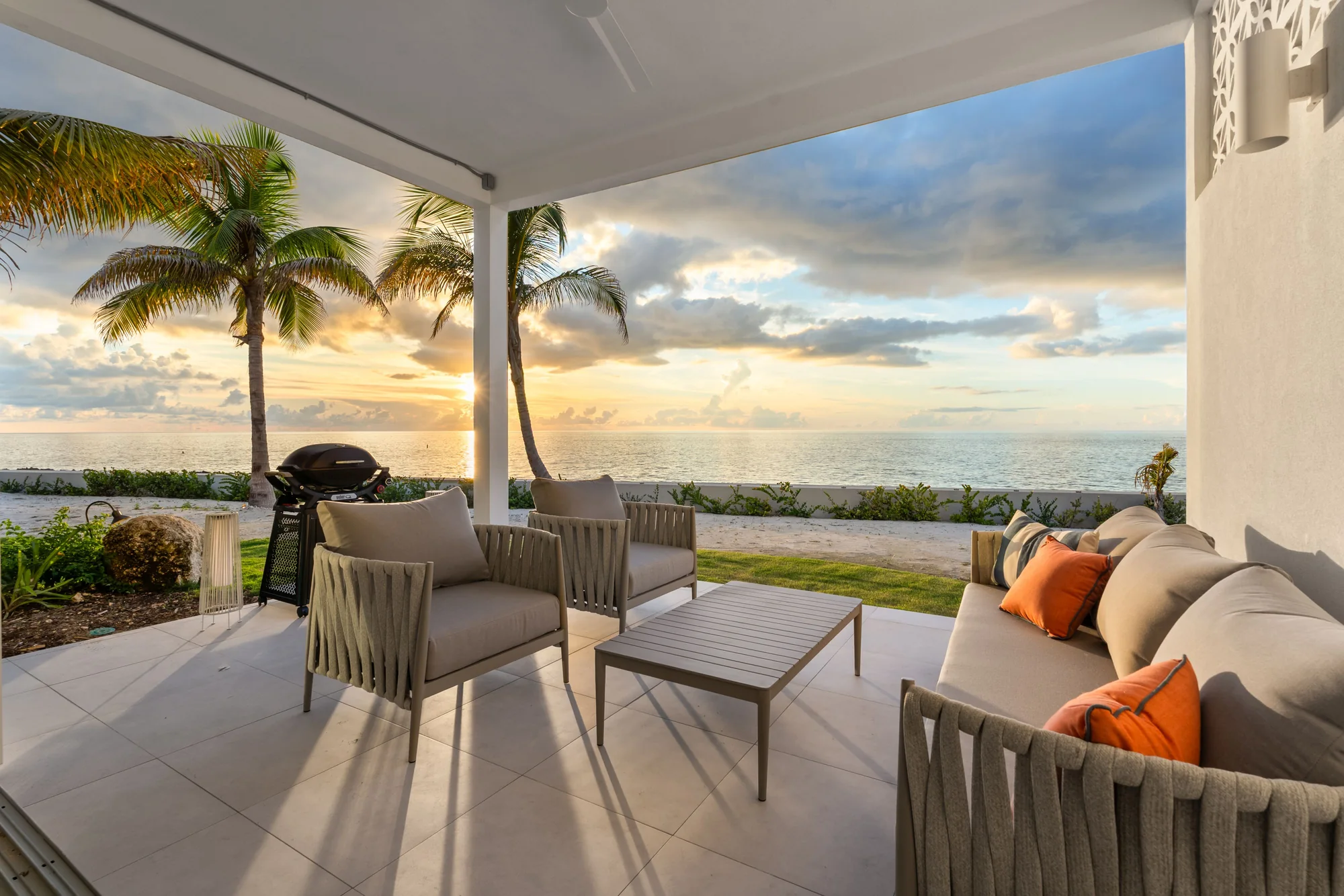 Oceanfront patio at sunset — Sunset Point