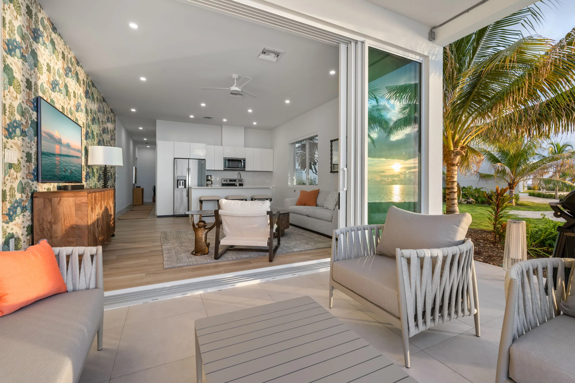 Living space opening to the patio — Sunset Point